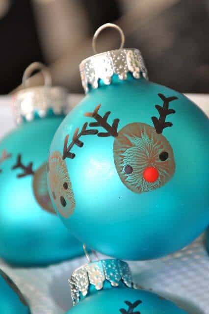 37 DIY Christmas Ornament Ideas For You Unique Decor 19 Vibrant turquoise Christmas ornaments featuring playful reindeer designs, measuring 3 inches, with faux antlers and red noses.