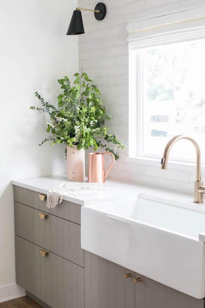 Sage green bedroom featuring a cozy aesthetic with a sage duvet cover, complemented by soft decor elements and ambient lighting.
